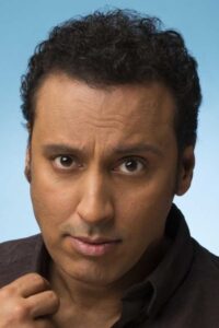 Porträt von Aasif Mandvi