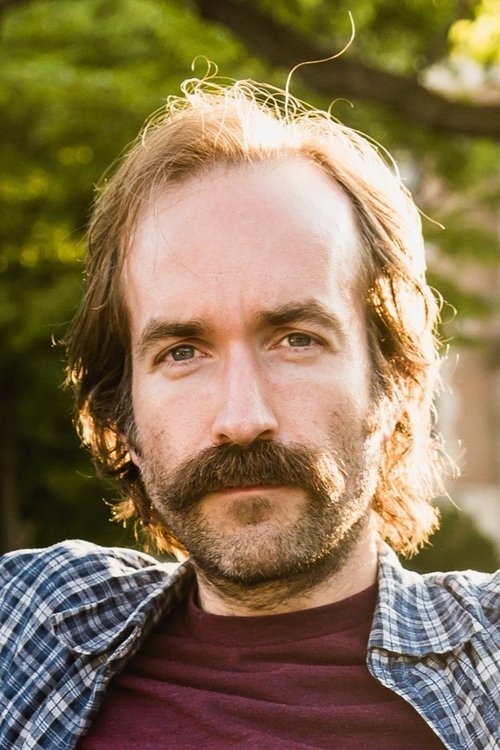 Porträt von Adam Brooks