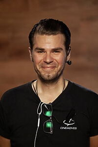 Porträt von Christopher Kelly