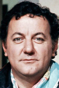 Porträt von Coluche