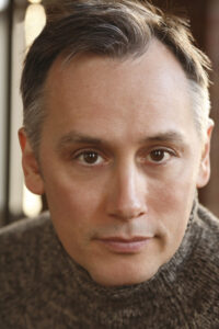 Porträt von David Aaron Baker