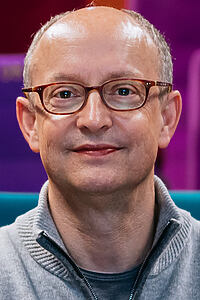 Porträt von Ed Guiney