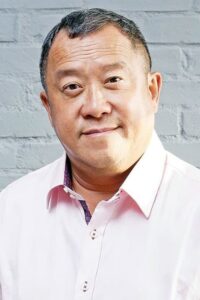 Porträt von Eric Tsang