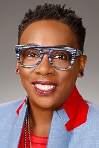 Porträt von Gina Yashere