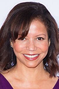 Porträt von Gloria Reuben