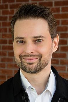 Porträt von Guy Busick