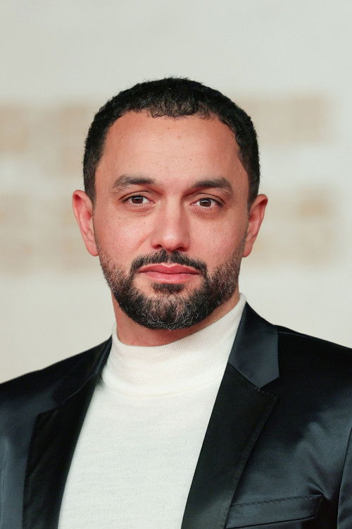 Porträt von Karim Amer