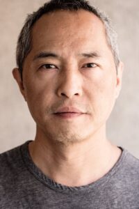 Porträt von Ken Leung